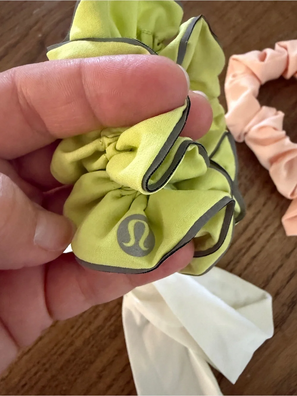 Set of Three Lululemon Scrunchies in Lime, Peach, and White